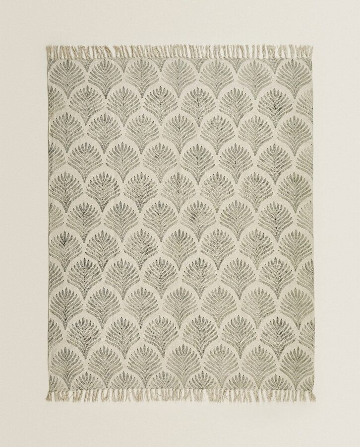 Kokvilnas paklājs ar palmu lapu rakstu (noma)